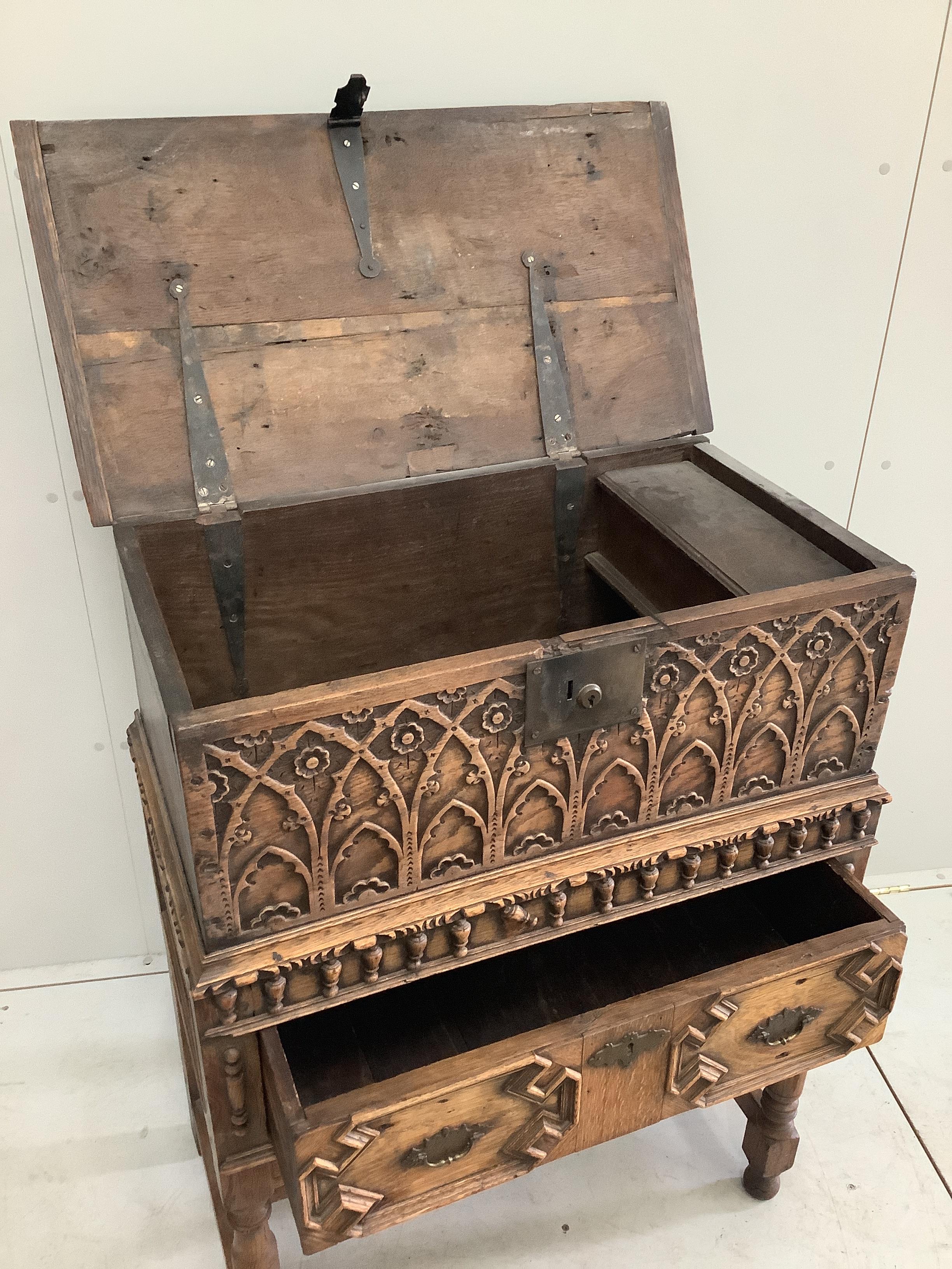 A 17th century style oak bible box on stand, width 81cm, depth 43cm, height 106cm